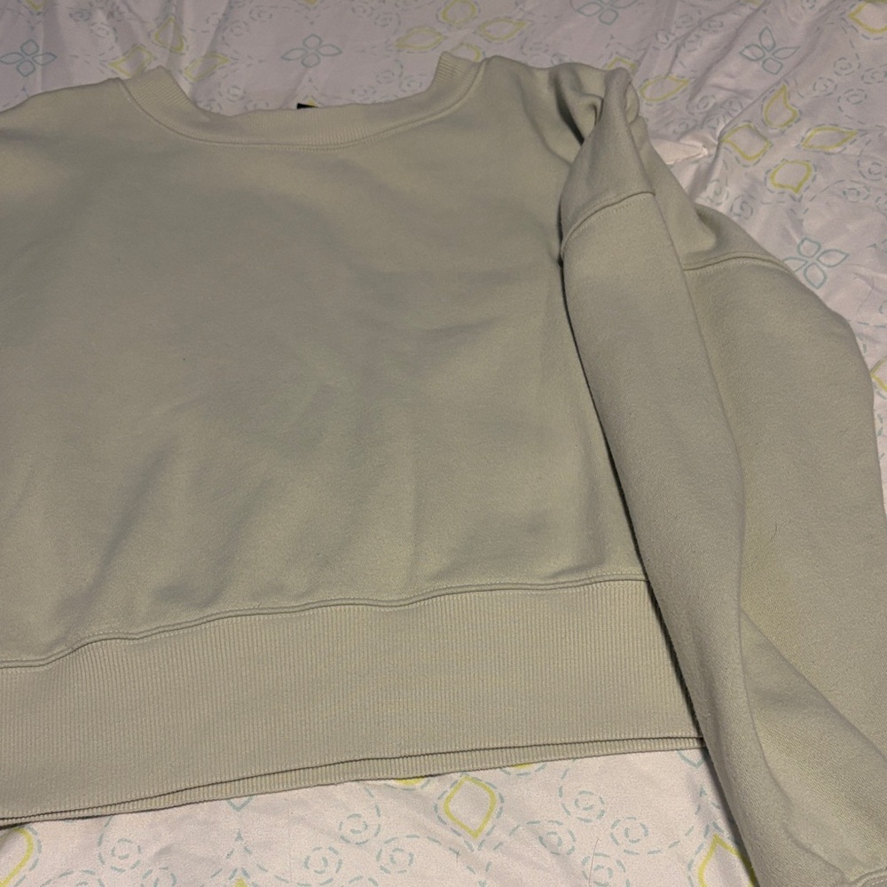Light green crew neck sweater